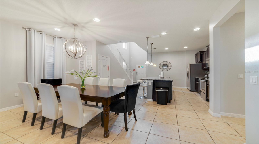 A charming Dining area sits just off the Kitchen, offering a convenient and cozy spot for daily dining.