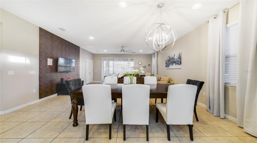 A charming Dining area sits just off the Kitchen, offering a convenient and cozy spot for daily dining.