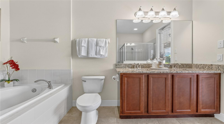 Ensuite Primary Bath with Garden Tub and Glass Enclosed Shower
