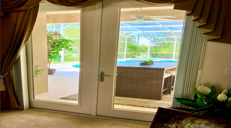 French Doors Open to Pool Area