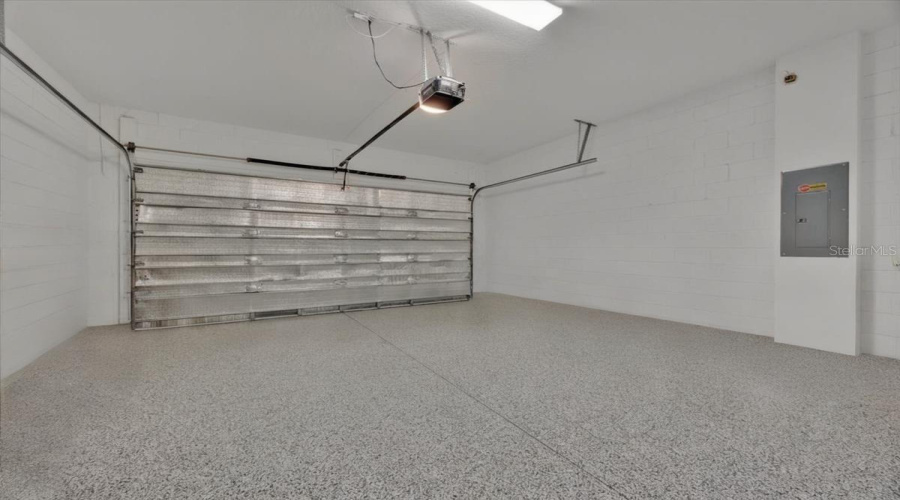 2 Cars Garage with Insulation to keep the temperature comfortable & a High-Gloss finish Epoxy floors