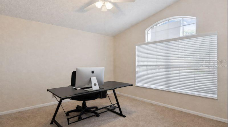Virtually staged. Seller has extra floor planks so that carpet can be changed to match.