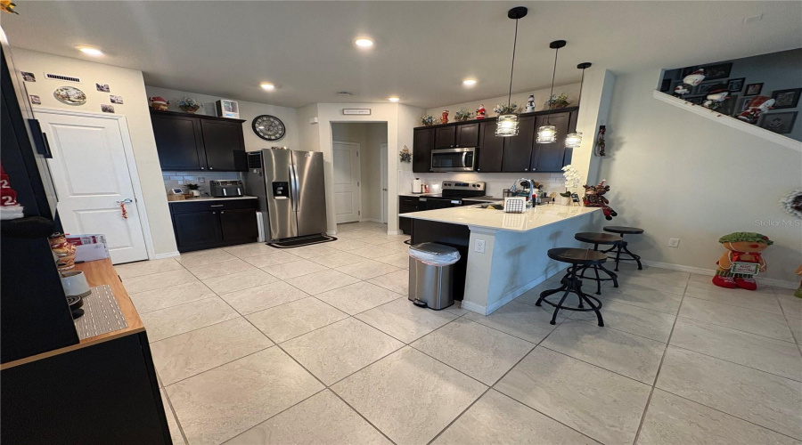 View from front door to Kitchen