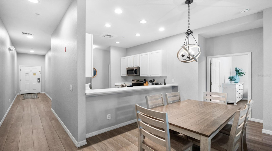 Entryway into kitchen and dining