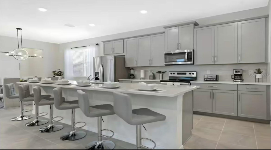 KISSIMMEE, Florida 34747, 6 Bedrooms Bedrooms, ,4 BathroomsBathrooms,Residential,For Sale,TROPICAL PALMS,0,MFRO6303971