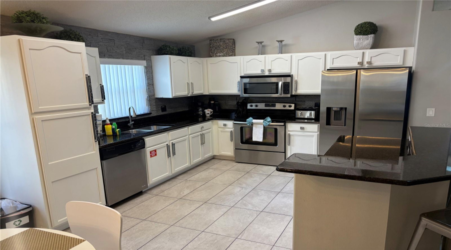 KISSIMMEE, Florida 34747, 5 Bedrooms Bedrooms, ,4 BathroomsBathrooms,Residential,For Sale,ROARING CREEK,0,MFRO6371323