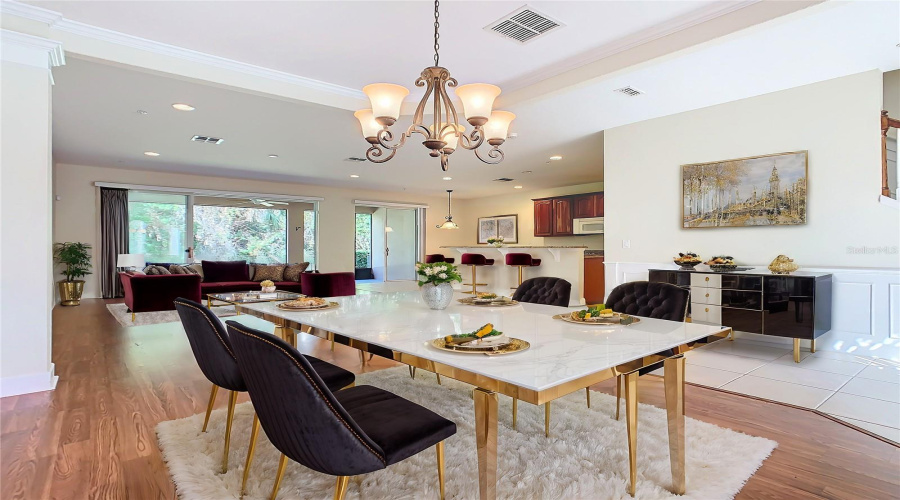 This photo gives an idea of how the dining and living room could be furnished to make it inviting for all.