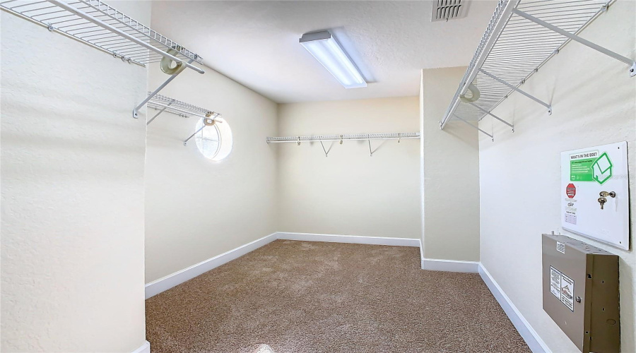 Plenty of room in this walk-in closet for clothes and storage.