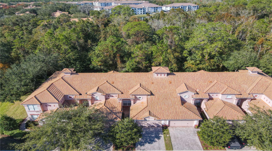 This view shows the property which is the third unit from the left.