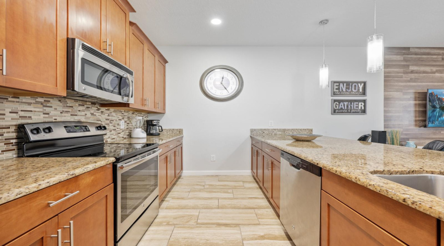 Whether you're cooking, baking, or entertaining, the spacious Kitchen is a welcoming hub for gathering with family and friends.