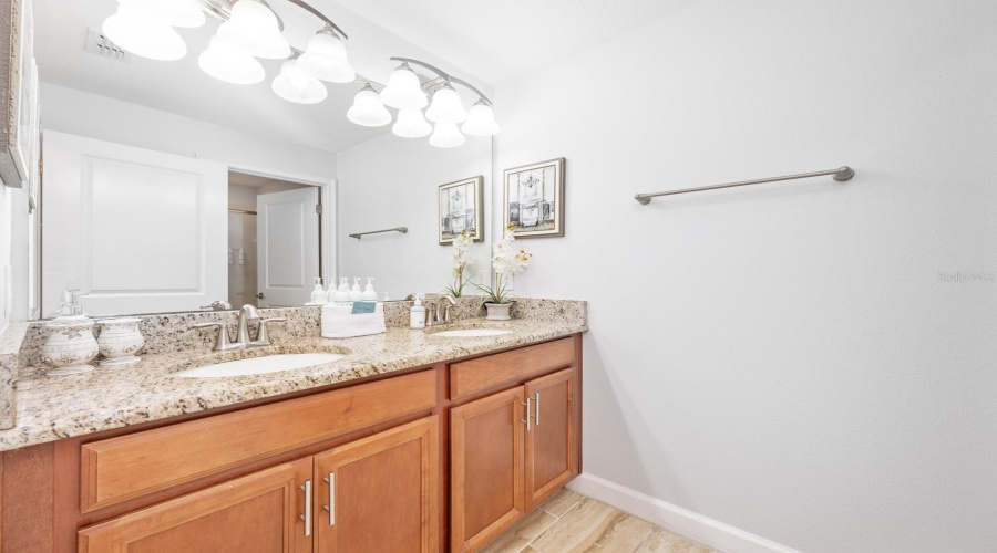 A third full Bath adds everyday practicality and serves the secondary Bedrooms with ease.