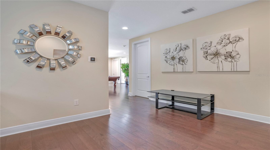 Hardwood Flooring upstairs creates a sense of warmth and harmony