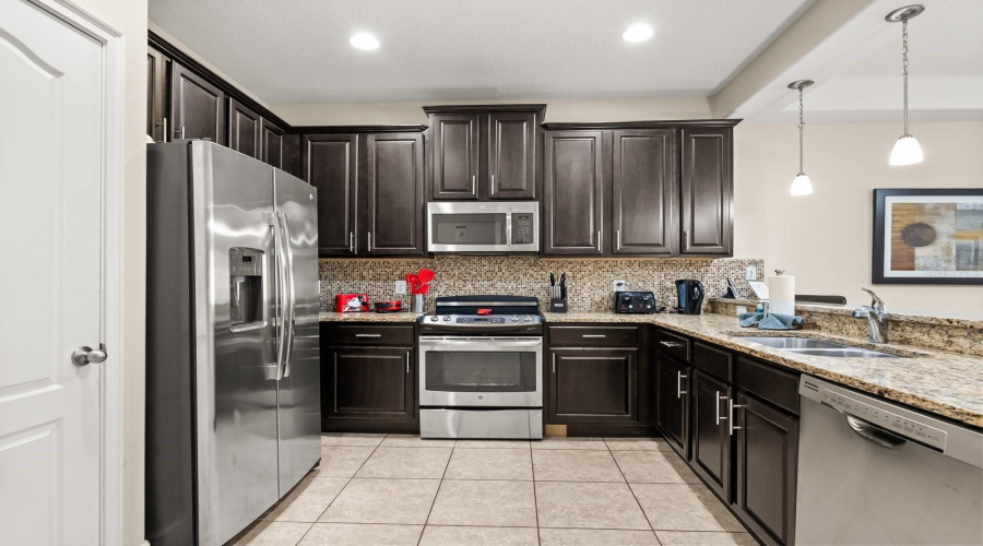 Kitchen w/ stainless steel appliances