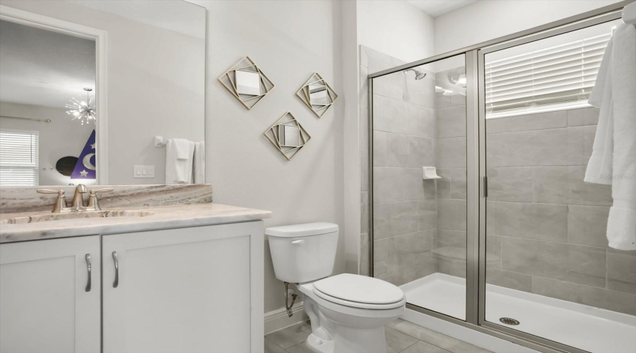 Additional bathroom for guest convenience.