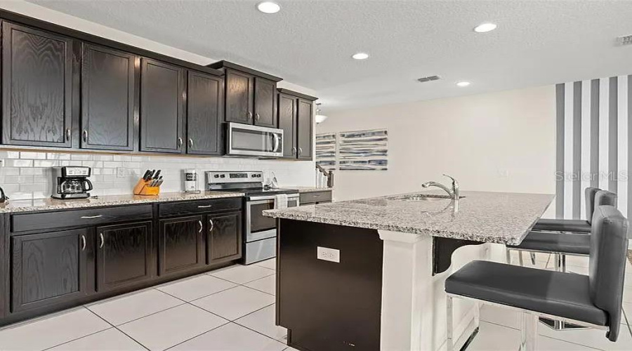 KISSIMMEE, Florida 34747, 5 Bedrooms Bedrooms, ,4 BathroomsBathrooms,Residential,For Sale,CAREY PALM,0,MFRO6367524