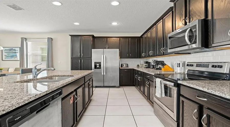 KISSIMMEE, Florida 34747, 5 Bedrooms Bedrooms, ,4 BathroomsBathrooms,Residential,For Sale,CAREY PALM,0,MFRO6367524