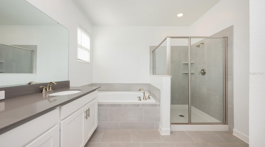 Unwind in the Primary en suite Bath after a busy day, your own spa-like escape within the home.