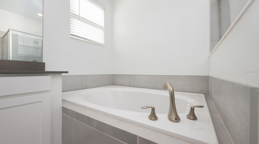 Unwind in the Primary en suite Bath after a busy day, your own spa-like escape within the home.