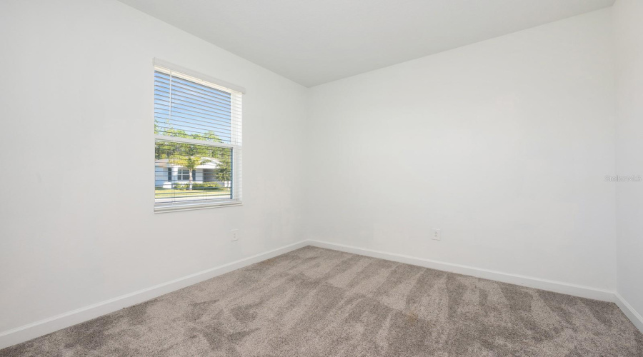 Bedroom 4 provides flexibility for use as a guest room, home office or hobby space.