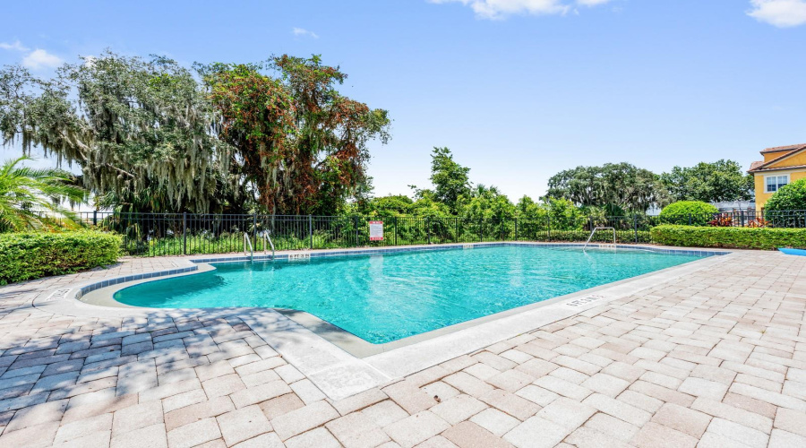 Enjoy leisurely afternoons relaxing by the sparkling community pool.