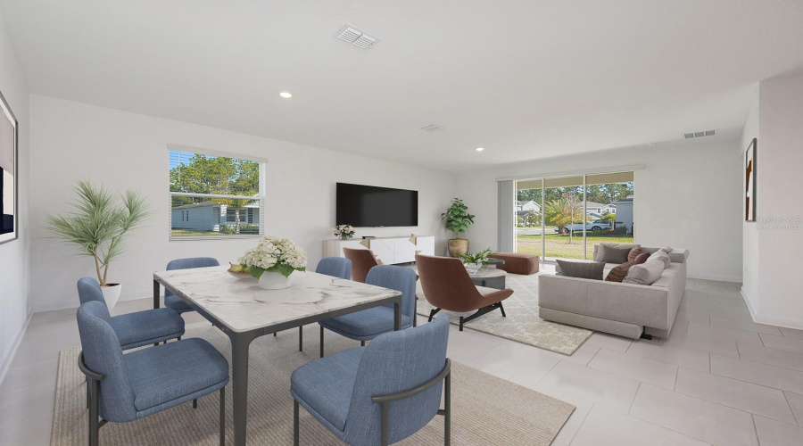 The open-concept layout offers an easy transition from the Living area to the Dining space with a natural, comfortable flow. Virtually Staged.