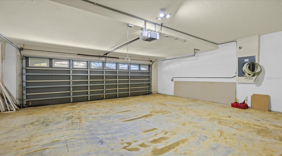 Garage for two vehicles with plug for electric vehicle charging