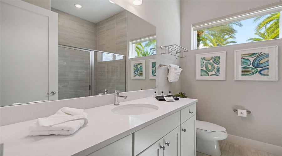 Suite 2 offers an inviting downstairs back of home location with a queen bed and a private full ensuite bathroom.