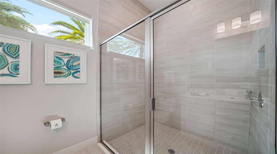 Suite 2 offers an inviting downstairs back of home location with a queen bed and a private full ensuite bathroom.