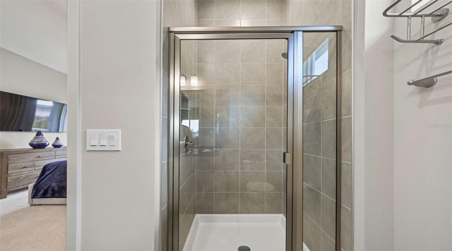 Suite 5 offers an inviting upstairs back of home location with a king bed and a private full ensuite bathroom.