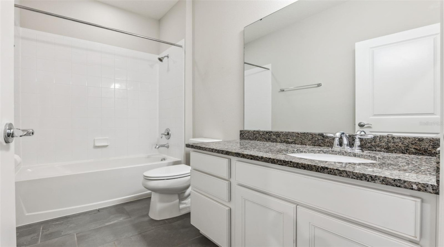 Bath 2 - Extra Long Granite Counter & Upgraded Cabinets