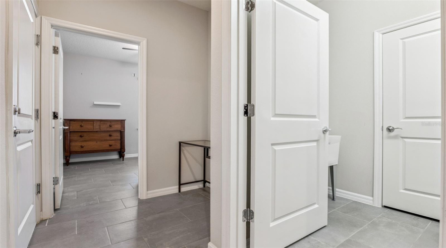 Split Bedrooms - this is hall from garage.  Space for a drop Zone