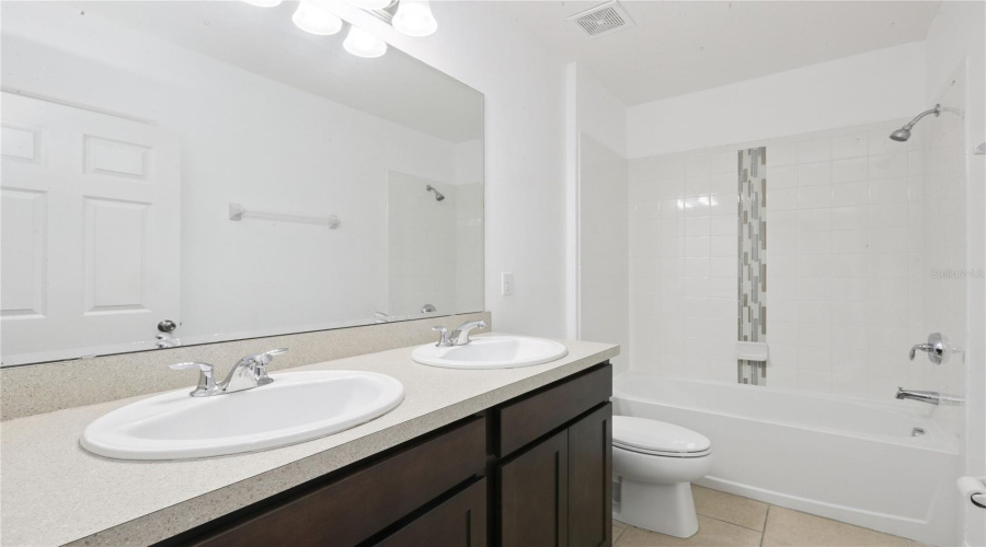 DAVENPORT, Florida 33837, 4 Bedrooms Bedrooms, ,2 BathroomsBathrooms,Residential,For Sale,SWAN SWIM,0,MFRO6342530