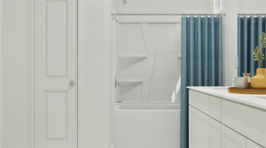 Virtually staged. Main bathroom suite