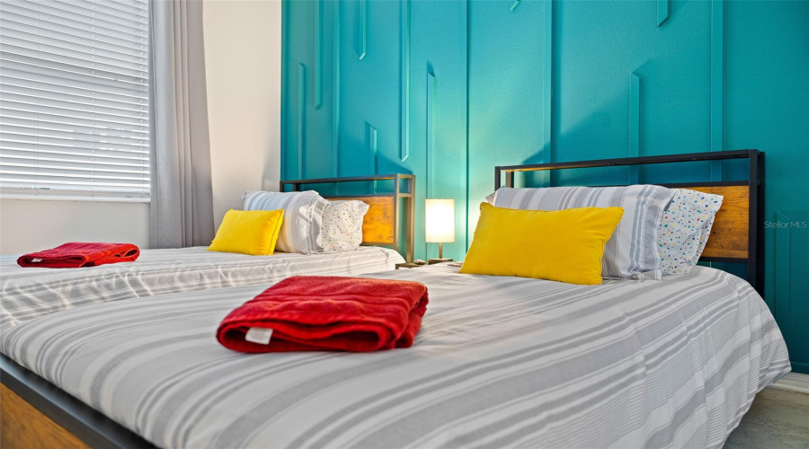 Bedroom 2 with feature wall