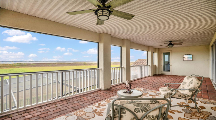 Upstairs screened balcony with panoramic lake views