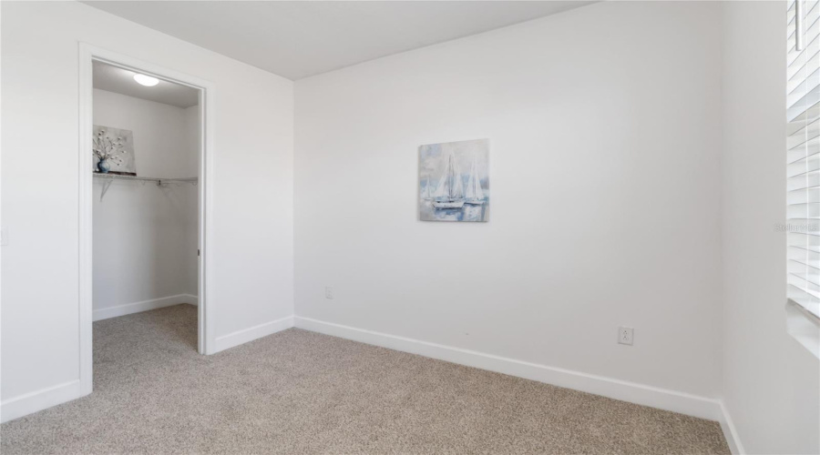 Front bedroom with walk in closet