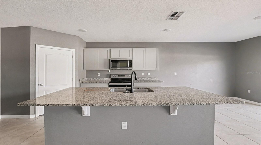 DAVENPORT, Florida 33837, 5 Bedrooms Bedrooms, ,3 BathroomsBathrooms,Residential,For Sale,SUGARWOOD,0,MFRTB8470294