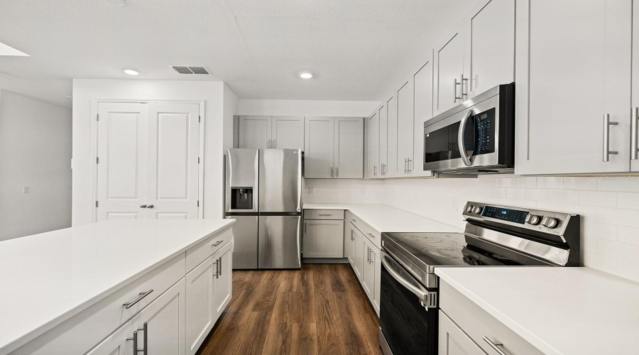 Kitchen- Quartz Counters and stainless Steel Appliances