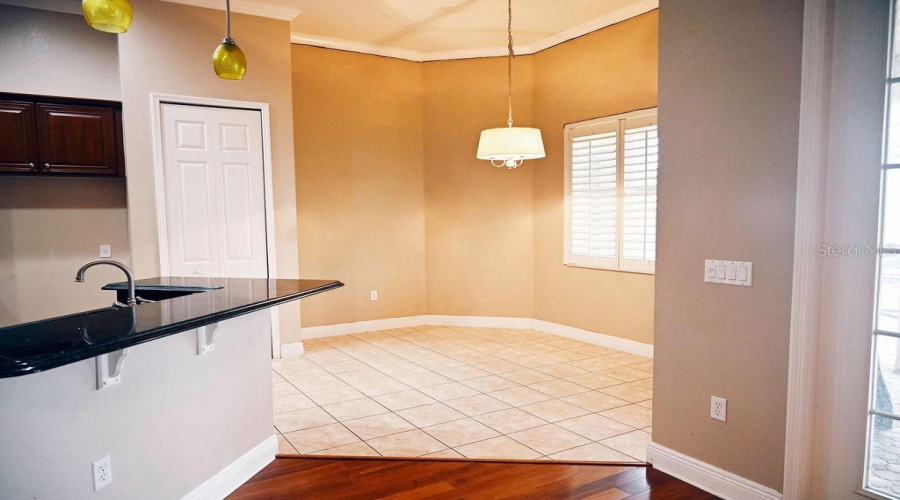 Dining nook with plantation shutters