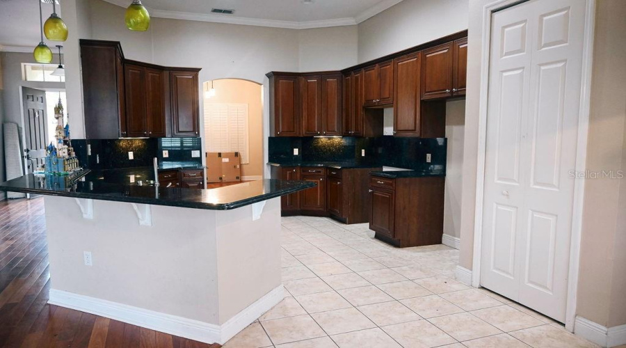 Dark cabinets, black granite tops!