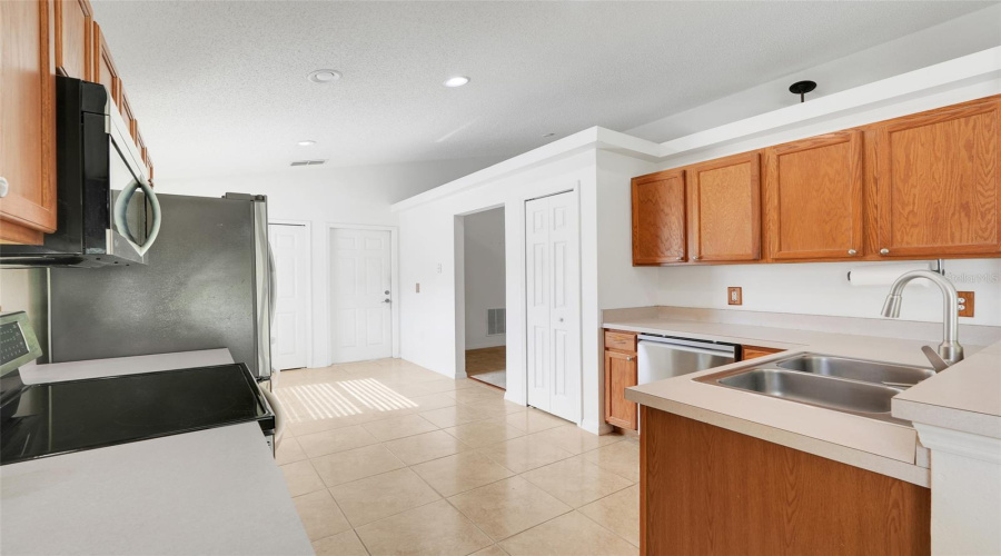 The kitchen features a pantry closet for additional storage.