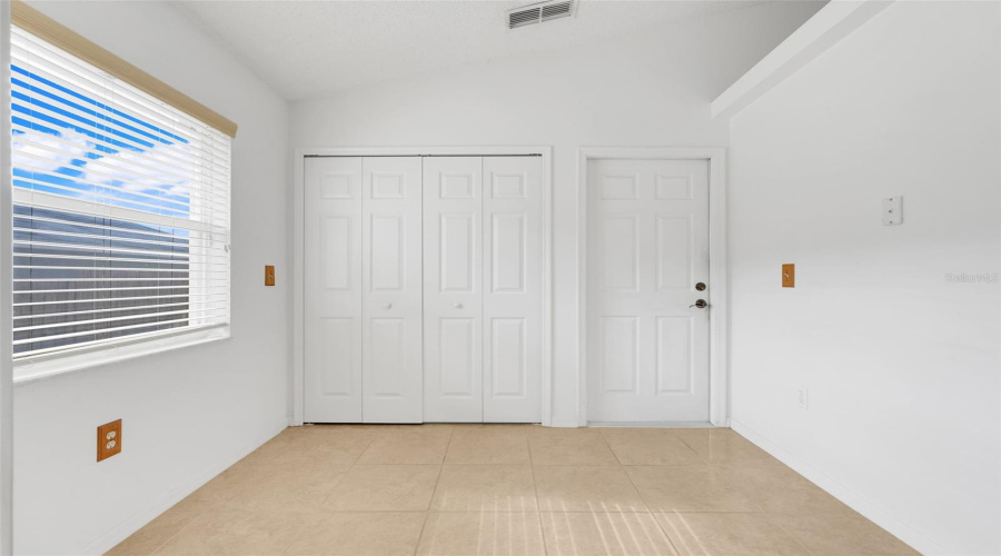 The space just off the kitchen can be utilized as a dinette.