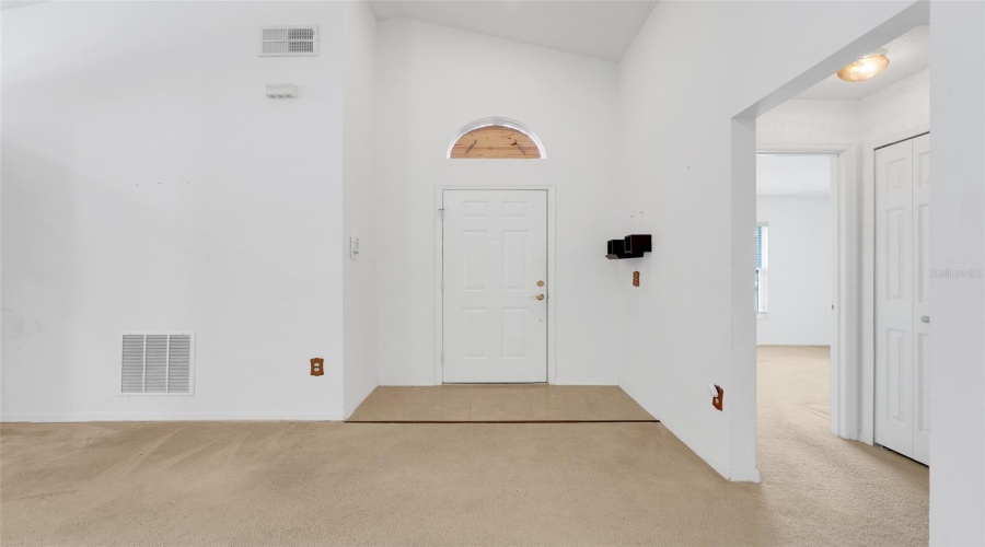 Note: All carpeted areas of this home have been replaced with laminate flooring and interior has been repainted.