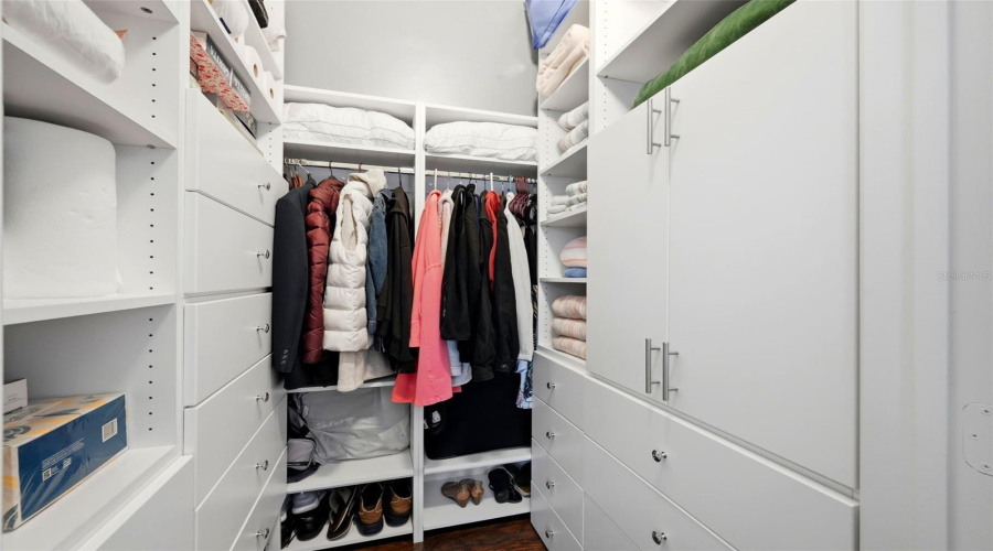 Guest Walk-In Closet with Custom Built-Ins