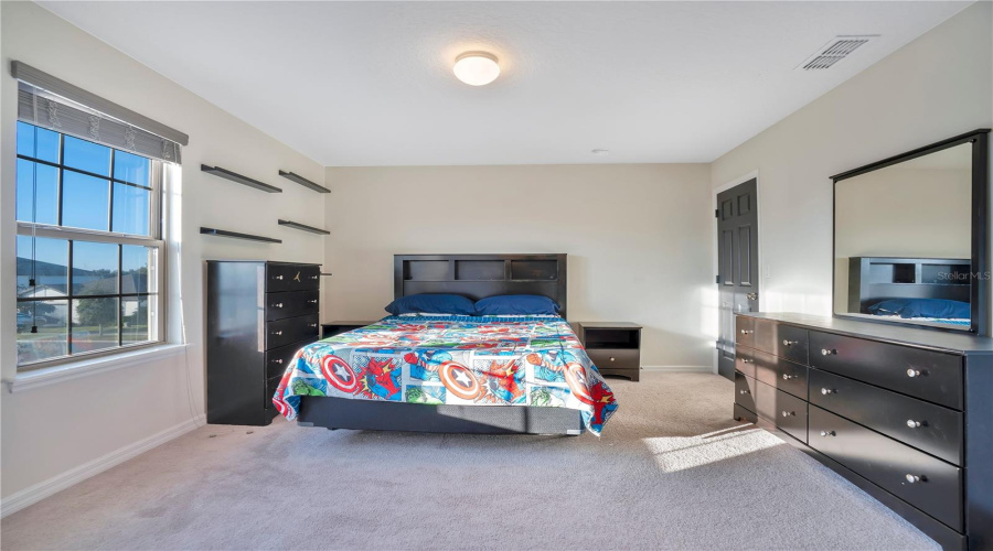 Upstairs bedroom with en-suite bath