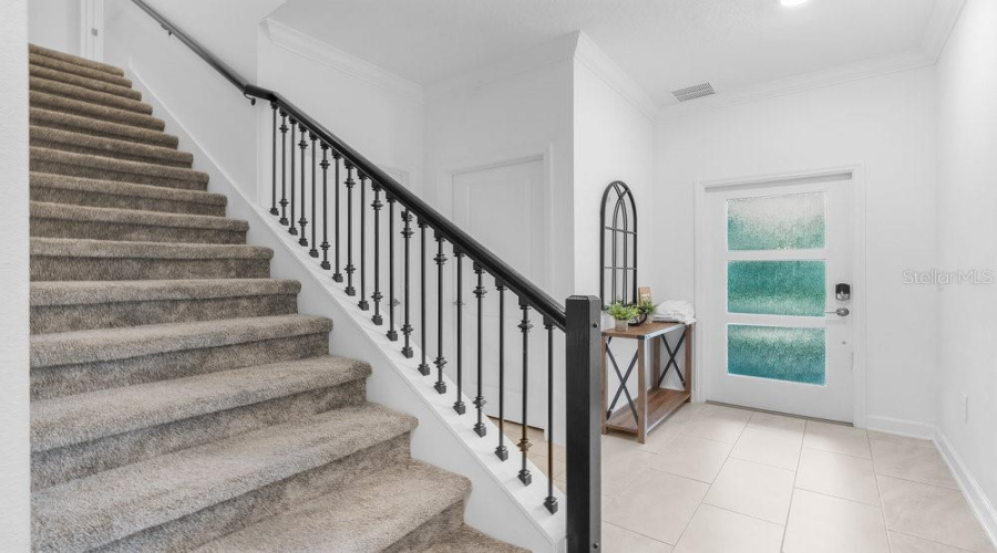 Entry way and elegant stair case