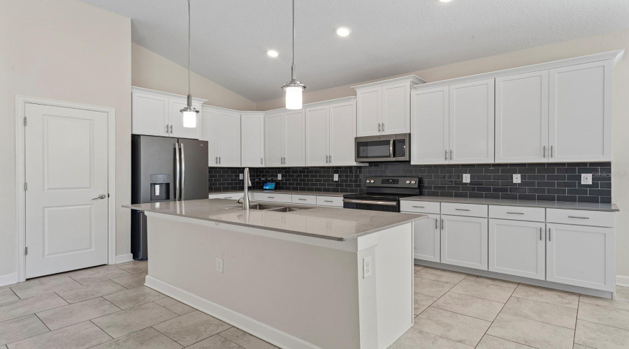 CHAMPIONS GATE, Florida 33896, 4 Bedrooms Bedrooms, ,3 BathroomsBathrooms,Residential,For Sale,OLYMPIC CLUB,0,MFRO6379232