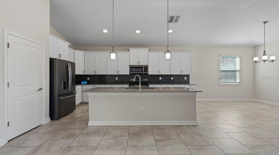 CHAMPIONS GATE, Florida 33896, 4 Bedrooms Bedrooms, ,3 BathroomsBathrooms,Residential,For Sale,OLYMPIC CLUB,0,MFRO6379232