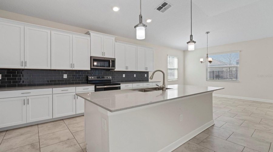 CHAMPIONS GATE, Florida 33896, 4 Bedrooms Bedrooms, ,3 BathroomsBathrooms,Residential,For Sale,OLYMPIC CLUB,0,MFRO6379232