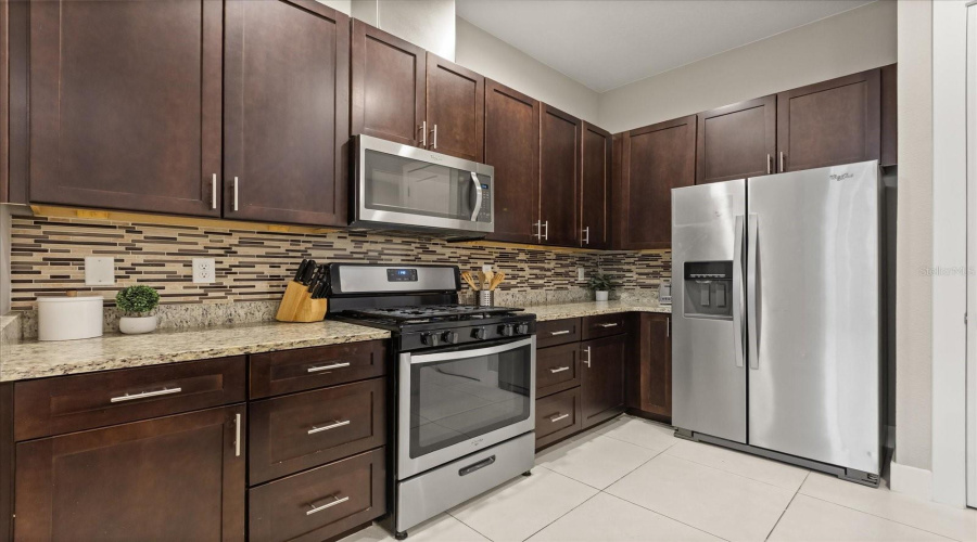 Kitchen, nice cabinetry & Stainless appliances